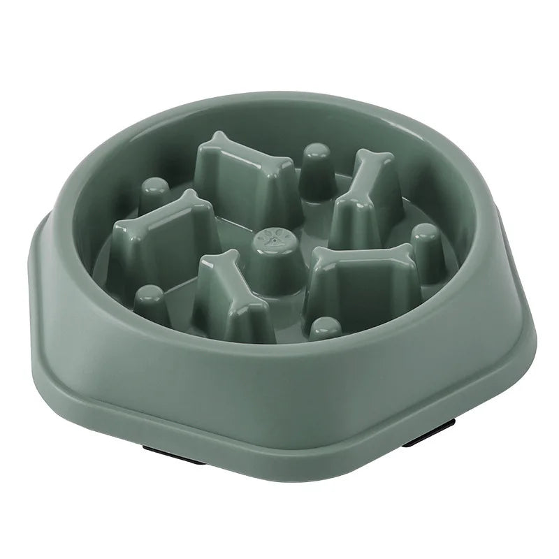 TRAGA™ es un cuenco de alimentación lenta fabricado en plástico resistente, diseñado para reducir la velocidad al comer, evitar atragantamientos y mejorar la salud digestiva de tu perro.